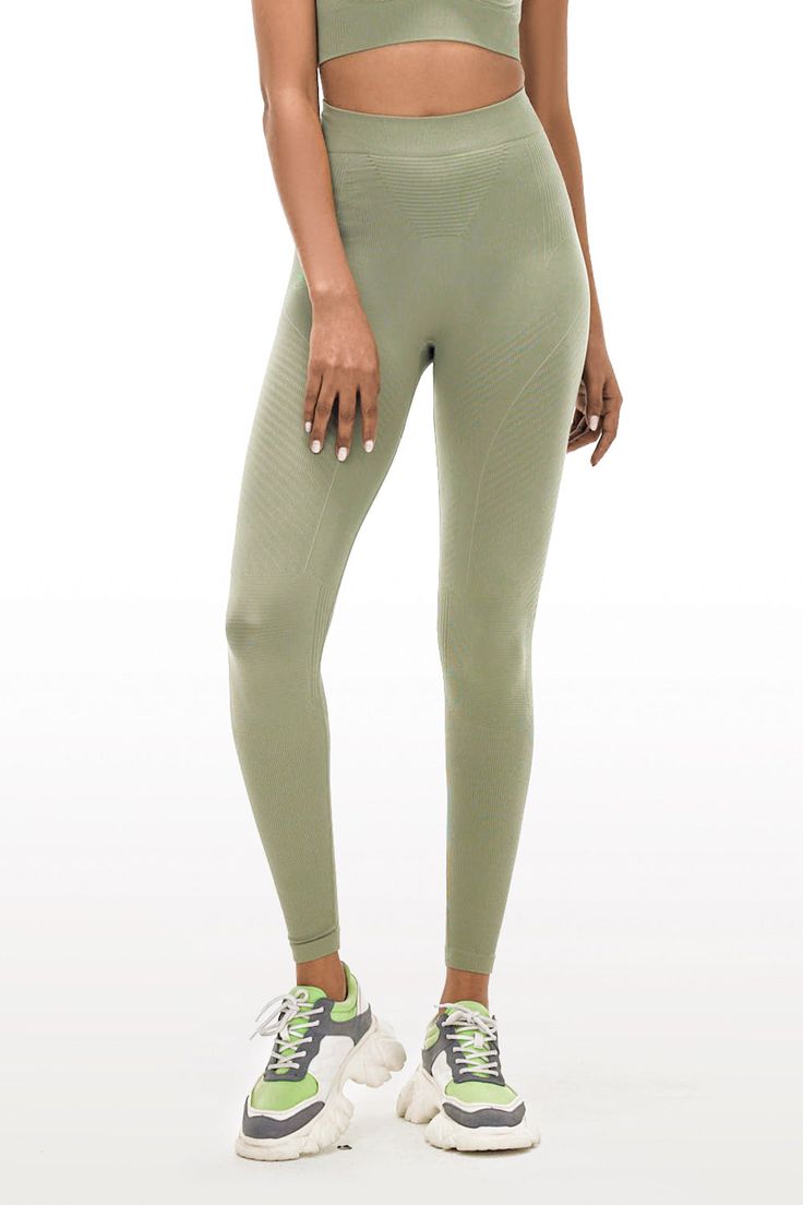 Prepare to breeze through hot yoga in the Energy Legging, an update to the popular full-length version. Made by Italian Seamless Weave with fragrance. Hits at the ankle on petites and pairs perfectly with your fave pair of sneakers or slides. Green Full-length Sporty Yoga Pants, Green Full-length Stretch Yoga Pants, Seamless Full-length Sports Leggings, Green Seamless Yoga Leggings, Green 4-way Stretch Sportswear Yoga Pants, Athleisure Women, Yoga Set, Performance Leggings, Hot Yoga