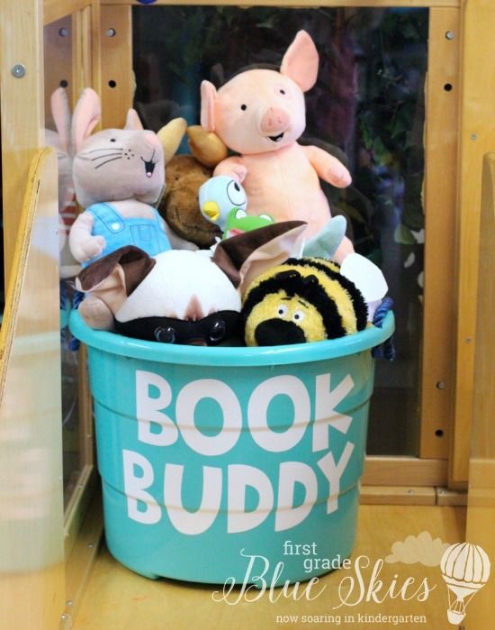 there is a bucket full of stuffed animals