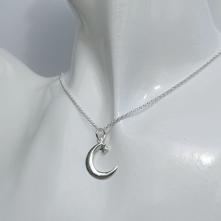 Chic, sophisticated and stylish. Just three ways to describe this gorgeous sterling silver necklace. A perfect addition to any occasion or outfit. It's design features a crescent moon and star, luxuriously polished and available on 4 different chain lengths. The pendant measures 2.3cm x 1.5cm and the necklace comes complete with a gift box. Ready to give,... or keep for yourself Moon And Star Necklace, Crescent Moon And Star, Boho Hippie Chic, Wave Ring, Moon Ring, Moon And Star, Amethyst Bracelet, Silver Moon, Photo Bracelet