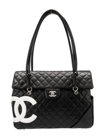 Chanel Shoulder BagFrom the 2004-2005 Collection by Karl LagerfeldBlack LeatherInterlocking CC Logo & Quilted PatternSilver-Tone HardwareDual Shoulder StrapsSingle Exterior PocketLogo Jacquard Lining & Three Interior PocketsZip Closure at TopProtective Feet at BaseIncludes Dust BagUnfortunately, due to restrictions, this item may not be eligible for shipping in all areas. Dr Accessories, Rolex Watches Women, I'm Broke, Chanel Shoulder Bag, Fame Dr, Saint Laurent Bag, Cc Logo, Accessories Jacket, Bag Handle