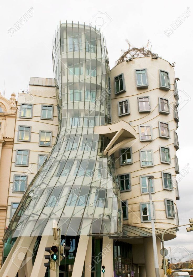 an unusual building in the middle of a city