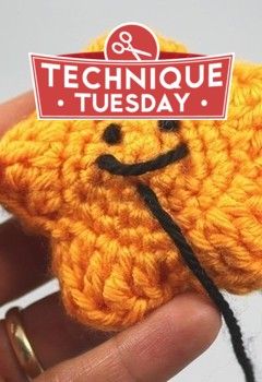 a small crocheted brooch with a sign on it that says technique tuesday