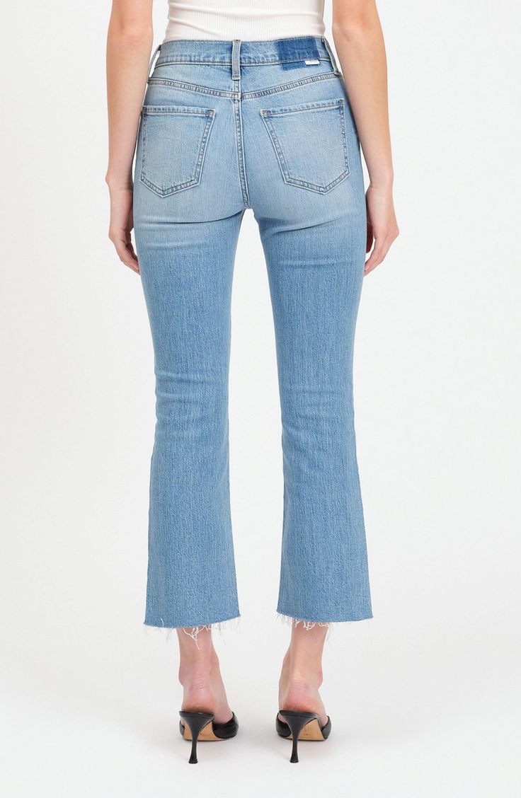 A faded wash and a raw-edge hem add to the vintage-inspired look of weekend-ready jeans cut from stretch-kissed denim. 26 1/2" inseam; 16" leg opening; 11 1/2" front rise; 15" back rise (size 29) Zip fly with button closure Five-pocket style 65% cotton, 34% organic cotton, 1% elastane Machine wash, dry flat Imported Mid-rise Distressed Medium Wash Flare Jeans, Fitted Light Wash Distressed Cropped Jeans, Faded Washed Cutoff Jeans, Light Wash Distressed Mid-rise Flare Jeans, Mid-rise Light Wash Distressed Flare Jeans, Trendy Faded Flare Jeans With Frayed Hem, Mid-rise Washed Blue Distressed Cropped Jeans, Cutoff Light Wash Flare Jeans For Fall, Faded Washed Cropped Flare Jeans