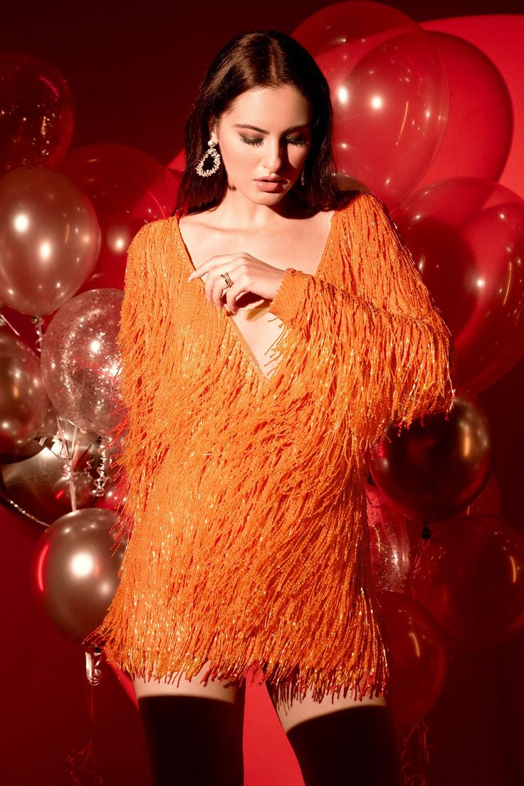 Orange four way stretch net full sleeved lined short dress with embroidered beaded tassels and a plunge V neck.
Component: 1
Pattern: Embroidered
Type Of Work: Beaded Tassels
Neckline: Plunge V
Sleeve Type: Long
Fabric: Four way Stretch Net
Color: Orange
Other Details: 
Beaded tassel embroidery
V neck
Approx weight (in kg) : 5 to 10
Attached lining
Note: The boots worn by the model are not for sale
Occasion: Cocktail - Aza Fashions Plunging V Neck Dress, Tassel Embroidery, Beaded Tassels, Dress For Women, Embroidered Dress, V Neck Dress, Aza Fashion, Full Sleeve, Short Dress