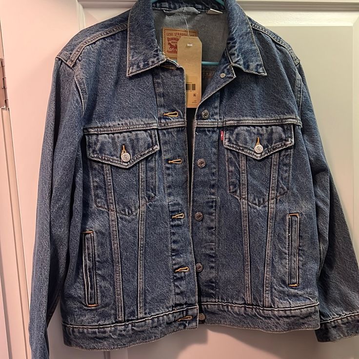 Levi’s 90s Trucker Denim Jacket - Never Worn! 90s Style Blue Denim Jacket For Fall, 90s Style Relaxed Fit Denim Jacket With Long Sleeves, 90s Light Wash Denim Outerwear, 90s Style Light Wash Denim Jacket For Fall, 90s Light Wash Denim Jacket For Fall, 90s Style Light Wash Outerwear With Pockets, 90s Light Wash Outerwear With Pockets, 90s Light Wash Outerwear For Spring, 90s Style Light Wash Spring Outerwear