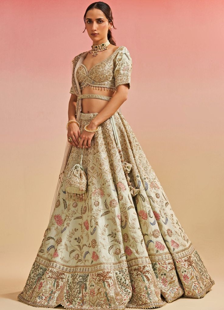 Pista Green Floral Raw Silk Lehenga Set Studio Iris - Fabilicious Fashion Studio Iris, Pink Bridal Lehenga, Raw Silk Lehenga, Pista Green, Floral Lehenga, Bridal Applique, Green Lehenga, Pink Lehenga, Embroidered Lehenga