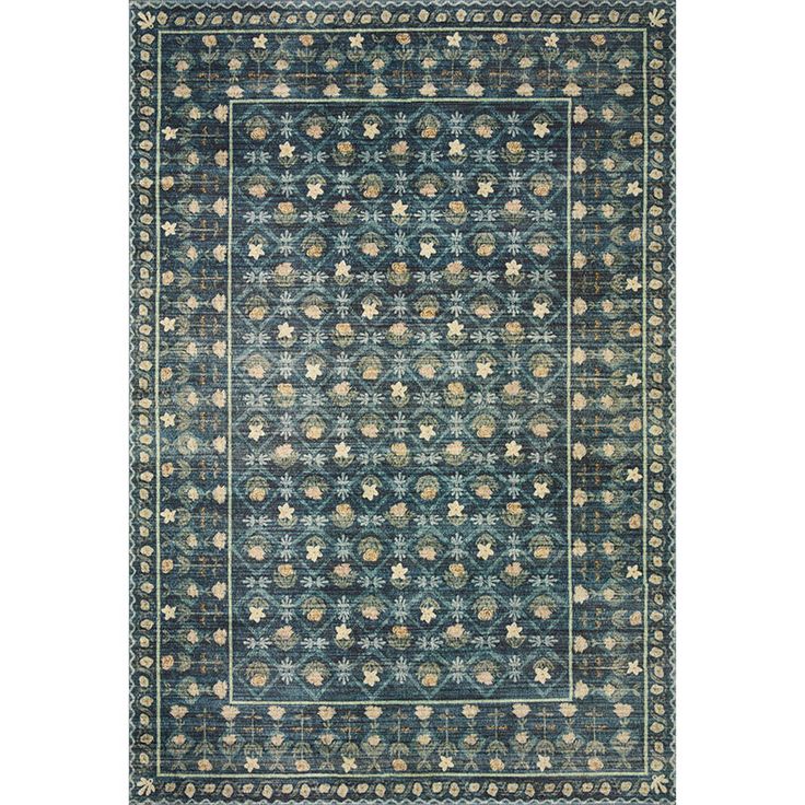 a blue and beige rug with an intricate design on the bottom, in front of a white background