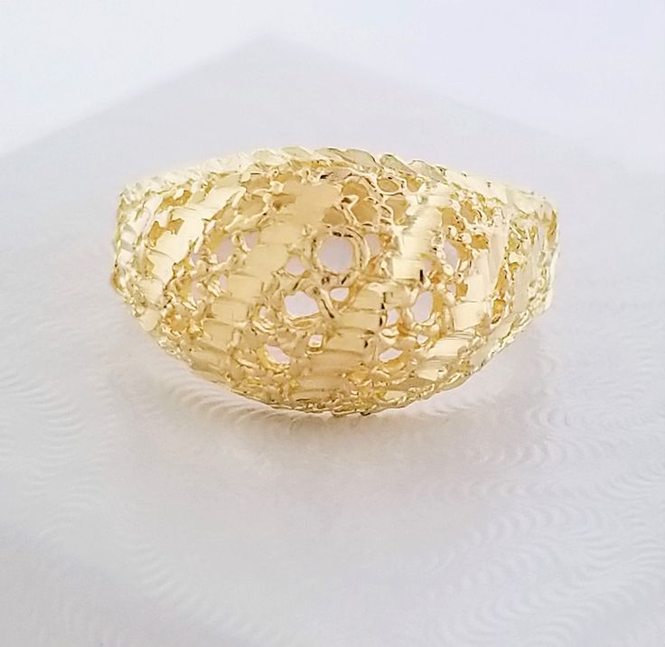 Dome ring. Details: Size: US 6 ( Can be sized ) Weight: 3.2 grams Band Width: Appx. 3mm Style: Dome ring Design: Diamond Cut Metal: 14k yellow gold Condition: Previously owned/great condition. Inside of band is stamped and tested for '14k' gold. All pieces are polished and refinished in our shop. SIZING: Currently this ring is a size 6 but could be sized up or down for an additional small fee if desired by adding custom ring sizing to your cart upon checkout. Most sizing can be done within 1-3 d Gold Filigree Promise Ring In 14k Gold, Gold 14k Filigree Promise Ring, 14k Gold Filigree Promise Ring, Gold Plated Yellow Gold Filigree Ring For Anniversary, Yellow Gold Dome Ring With Diamond Cut For Gift, 14k Yellow Gold Filigree Ring As Gift, 14k Yellow Gold Filigree Ring, Gold Filigree Fine Jewelry Rings, Gold Filigree 14k Gold Rings