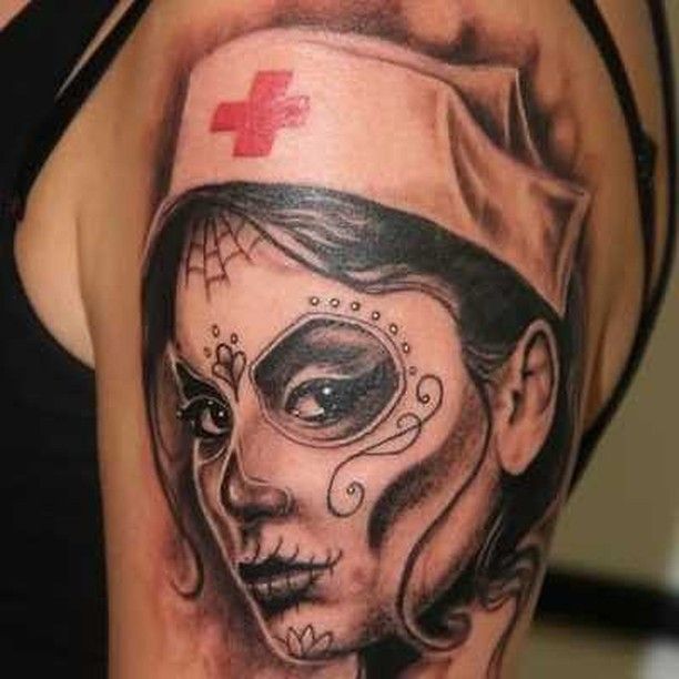 a woman with a nurse's hat and cross on her head is depicted in this tattoo design