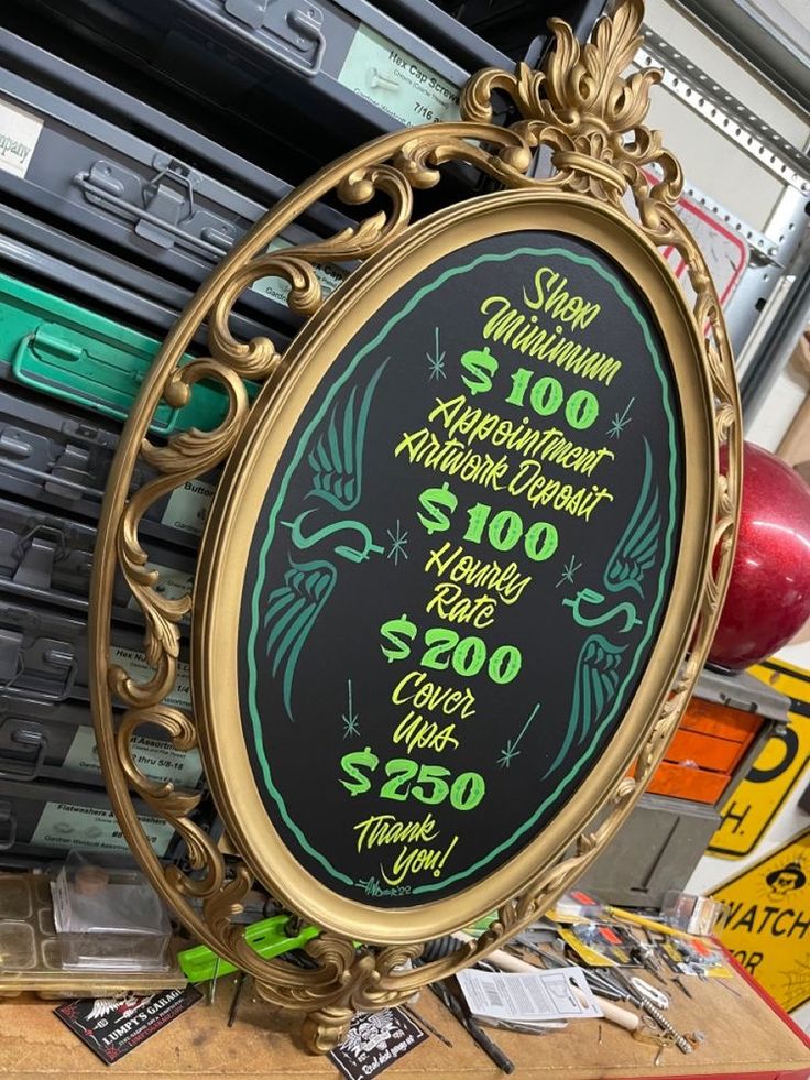 there is a sign that says $ 100 in front of some type of metal frame