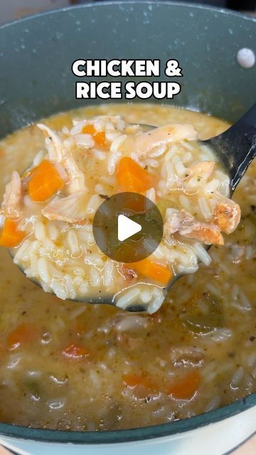 chicken and rice soup being stirred with a ladle