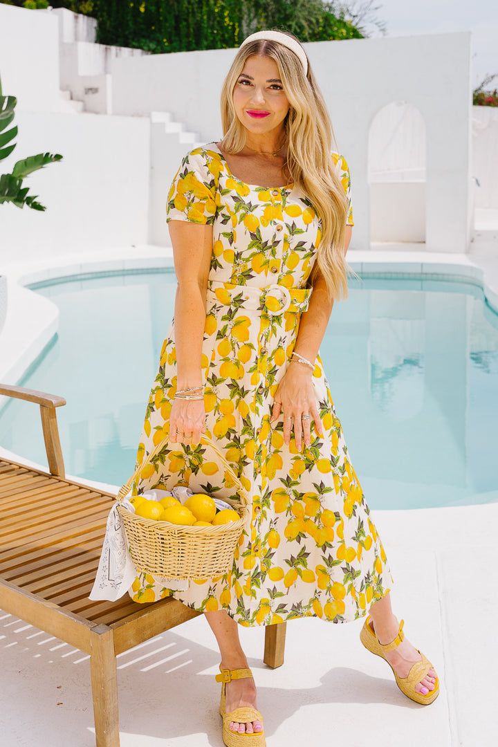 Meredith Dress in Lemons – Ivy City Co Yellow Summer Dress With Fruit Print, Summer Lemon Print Midi Dress, Summer Lemon Print Dress For Brunch, Summer Brunch Lemon Print Dresses, Casual Lemon Print Midi Dress For Spring, Casual Lemon Print Midi Dress For Summer, Casual Spring Midi Dress With Lemon Print, Midi Length Lemon Print Dress For Garden Party, Casual Summer Midi Dress With Lemon Print