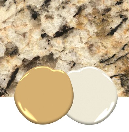 two white and gold paint colors next to each other on a marble countertop with an apple in the middle