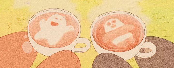 two coffee mugs with ghost faces on them sitting next to each other in front of a yellow background