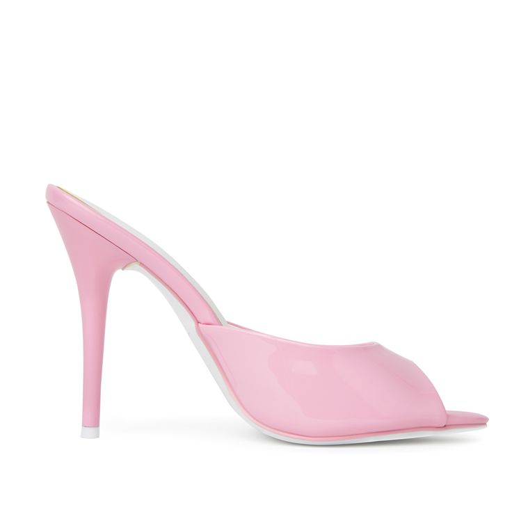 The Ford is a minimal mule that will garner all the attention. Pink Patent Vegan Leather with a classic open toe front and angled 4.5" heel. Sexy but comfortable! Size and Fit Information: U.S. Sizing Available in whole and half sizes Runs true to size, but some customers size up a half size since it is an open back (Note: Not using leather and other materials from animals significantly reduces environmental impact, however, we acknowledge that synthetic alternatives are not without environmenta Sleek Open Toe Heels With 4-inch Heel, Trendy Open Toe Mules With 4-inch Heel, Modern Open Toe Mules With 4-inch Heel, Sleek Mules With 4-inch Open Heel, Chic Slide Heels With Padded Heel, Fitted Closed Toe Mules With 4-inch Heel, Modern Fitted Mules With Deep Heel Cup, Fitted Open Toe Sandals With Deep Heel Cup, Summer Formal Slide Heels