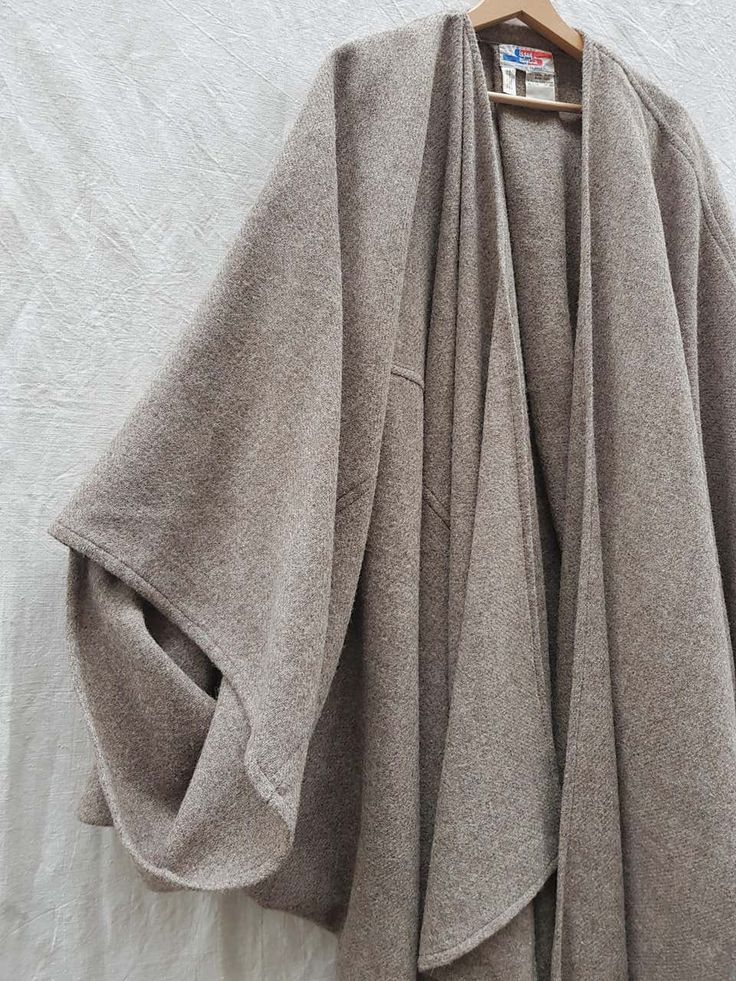 For Sale on 1stDibs - Heavy wool cocoon coat by Issey Miyake, an archive piece! -Heather beige/grey -Pleat detail on back -Oversize fitting -Made in France -100% Wool -1976 Cocoon Coat, Issey Miyake, On Back, Fabric Design, France, Wool, Grey, For Sale, Fashion Design