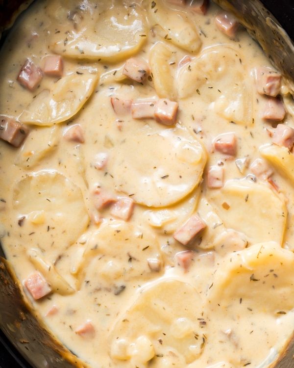 the food is prepared and ready to be cooked in the slow cooker or crock pot