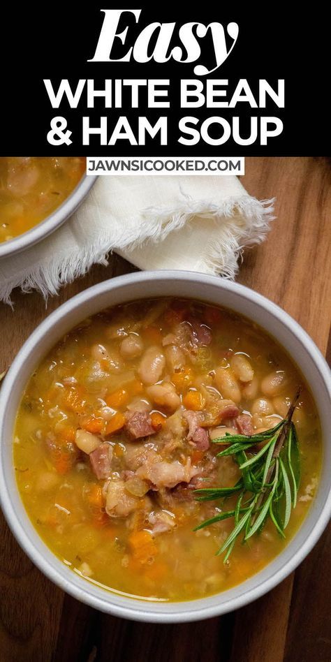 two bowls of white bean and ham soup with rosemary garnish on the side