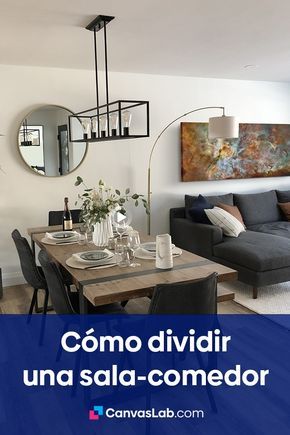 a living room filled with furniture next to a dining table and mirror on the wall