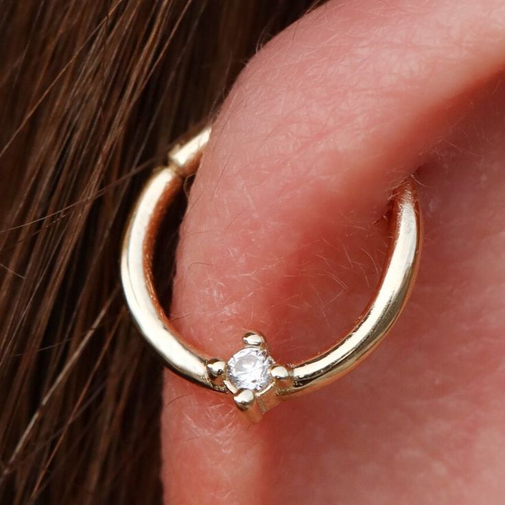 14K Solid Gold Hinge Hoop Earring, Zircon Stone Hoop Earrings, Gold Nose Ring, Nose Hoop Piercing, Daith Earring, Cartilage Hoop Material : 14K Gold, Rose Gold, White Gold Inner: 8 mm Outer: 10 mm Thickness: 1,1 mm * This piercing is sleek and stylish. It is produced carefully to make you and your loved ones happy. Prepared with love and experience. * 100% Handmade * All jewelry comes in beautiful packaging, gift ready. * All products are made to order in Turkey. Please review the customs proced Small Hoop Piercings For Anniversary, Hoop Piercings With Prong Setting For Anniversary, Diamond Hoop Piercings As Gift, Hoop Septum Ring With Prong Setting As Gift, Diamond Hoop Piercings, Hypoallergenic Hoop Septum Ring For Anniversary, Diamond Hoop Piercings For Gifts, Hypoallergenic Hoop Piercings For Weddings, Hypoallergenic Hoop Wedding Piercings