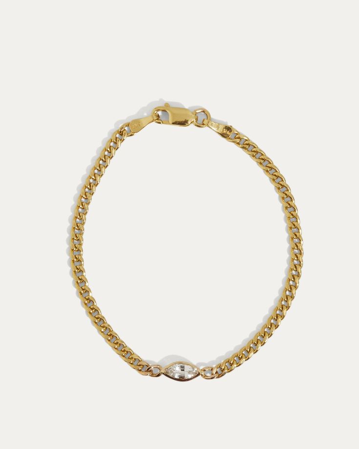 Our curb link marquee bracelet is a stylish cute addition to your wrist. Can be worn along, or stacked with other bangles, bracelet or even a watch. 14K Yellow Gold Bezeled White Sapphire Marquee Size 6, 6.5 or 7 inch bracelet Formal Oyster Bracelet Chain Link Jewelry, Timeless Gold Curb Chain Bracelet, 14k Gold Curb Chain Bangle Bracelet, Gold Plated Curb Chain Bracelets, 14k Gold Diamond Jubilee Bracelet With Oval Links, Timeless Link Bracelets With Oyster Design, Yellow Gold Diamond Bracelet With Oyster Clasp, Diamond Oyster Bracelet In Yellow Gold, Everyday 14k Gold Chain Bracelet With Oyster Design