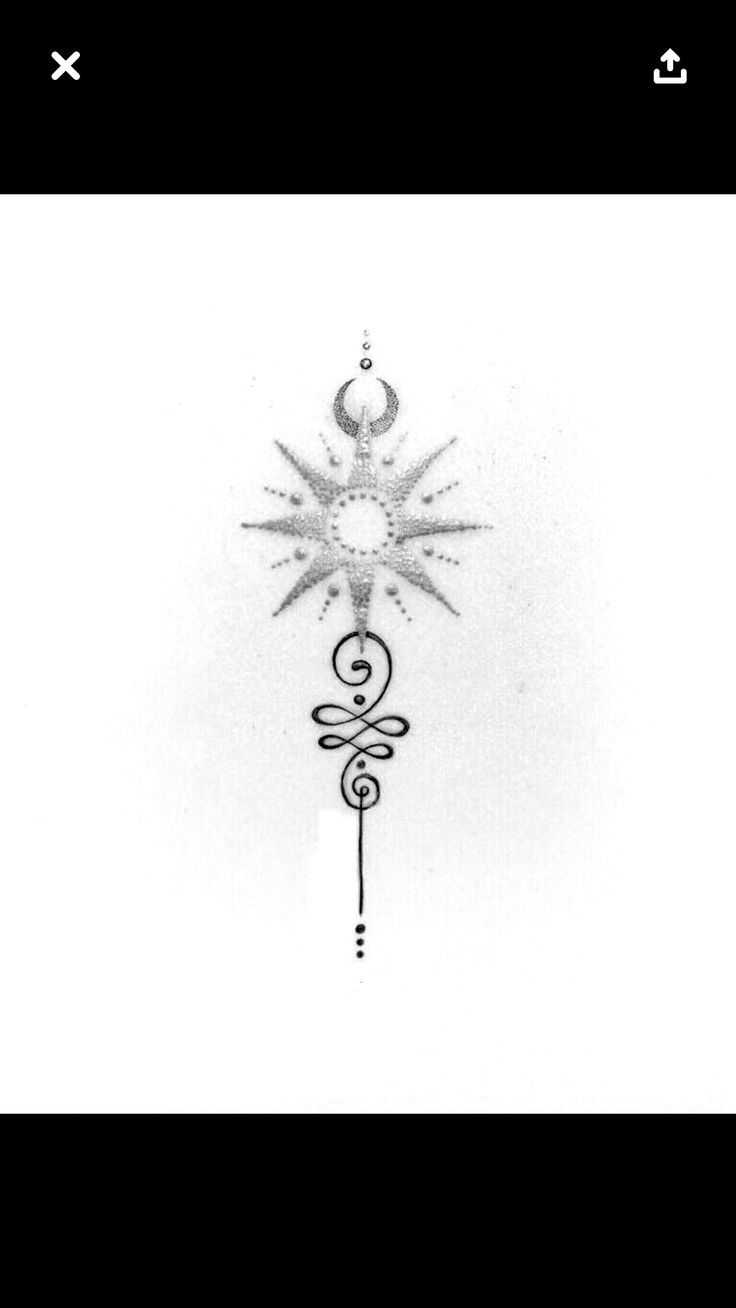 a black and white photo of a sun tattoo