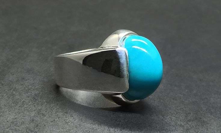 Natural Cabochon Oval 10 Carat Neshapuri Feroza Sterling Silver 925 Handmade Mens Ring Product: Ring Gemstone: Turquoise Color: Blue Handmade Ring All of our Handmade Rings are pure 925 Sterling Silver with Natural Gemstones. Polished Turquoise Ring For Anniversary, Anniversary Turquoise Ring With Polished Finish, Classic Blue Domed Jewelry, Blue Domed Jewelry With Polished Finish, Blue Domed Gemstone Ring, Handmade Turquoise Ring For Formal Occasions, Handmade Oval Turquoise Ring For Formal Events, Handmade Oval Turquoise Ring For Formal Occasions, Classic Blue Domed Ring