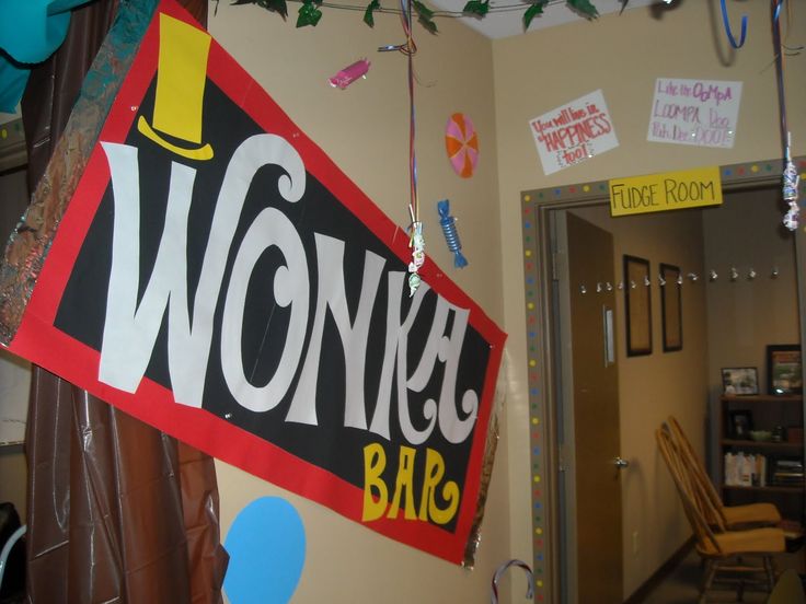 a sign hanging from the side of a wall that says wowwee bar on it