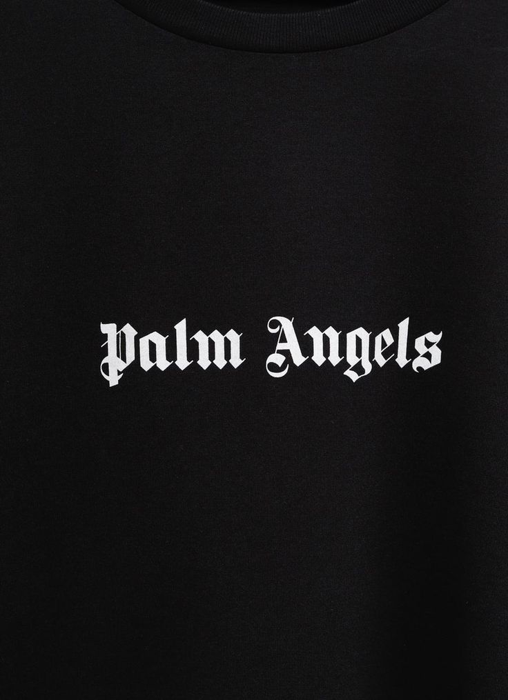 the palm angels logo on a black shirt