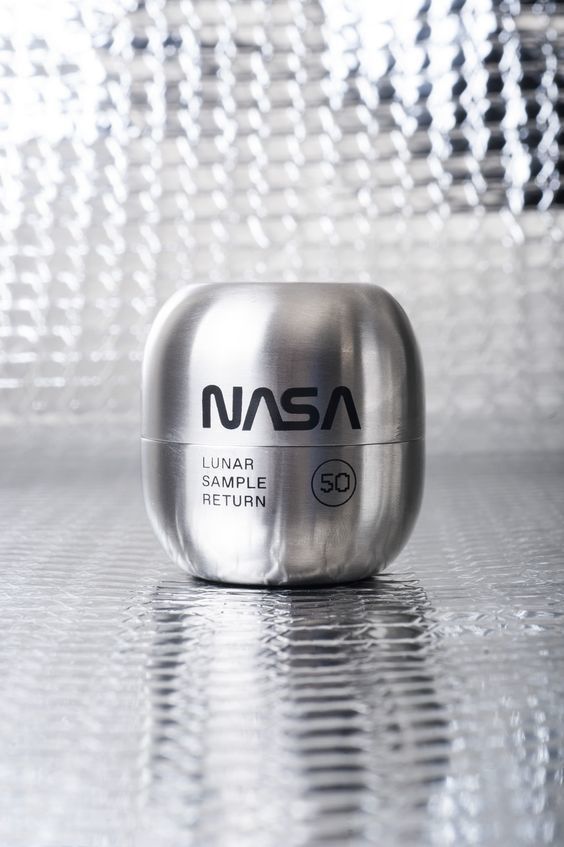 an image of a silver container with nasa on it