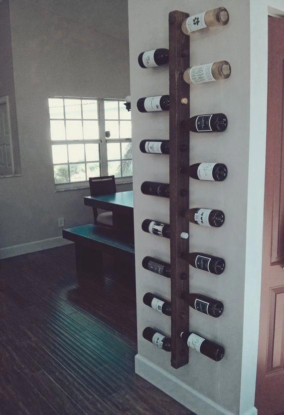 a wine rack with many bottles on it