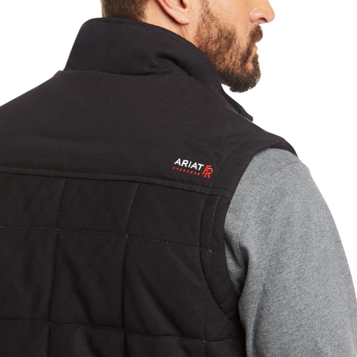 Work comfortably and confidently. This expertly constructed flame-resistant vest combines superior lightweight warmth with trustworthy safety features. CAT 3 ATPV 39 cal/cm2 NFPA 70E NFPA 2112 15 oz quilted canvas with insulation 6.5 oz Sauk Sateen II lining Cool Climate Insulation™ provides optimal lightweight comfort and warmth Vislon® zipper 48% cotton, 33% modacrylic, 12% polyester, 7% nylon Made in Nicaragua with fabric from the USA | Men's FR Crius Insulated Vest in Black Cotton, Small by Fitted Quilted Outerwear For Outdoor Activities, Functional Fitted Cotton Outerwear, Black Cotton Functional Outerwear, Fitted Cotton Outerwear With Fleece Lining, Heavy Jacket, Work Shirt, Work Shirts, Nicaragua, Black Cotton