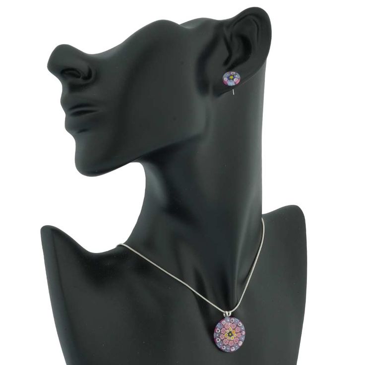 This trendy yet classic Murano Millefiori Pendant and Earrings Set turns any woman into a queen with its bright colors, unique flower patterns, and festive look. With their unique heritage rooted in Venetian history and Murano artisan tradition, Murano glass masters crafted this set using the ancient Millefiori technique. The colorful mosaic design made of tiny pieces of glass fused together in a special furnace is a rare and unique reflection of the beauty of Venice. Measurements: The Murano Gl Murano Jewelry, Murano Glass Earrings, Colorful Mosaic, Murano Glass Necklaces, Earrings Sets, Murano Glass Jewelry, Mosaic Design, Unique Flower, Necklace And Earrings Set