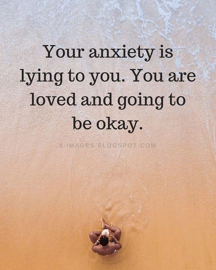 a person laying on top of a beach next to the ocean with a quote above it