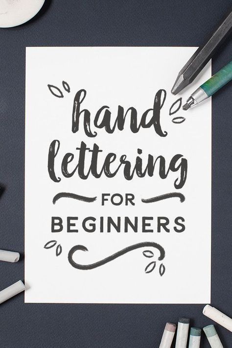 hand lettering for beginners with crayons and markers on the table next to them