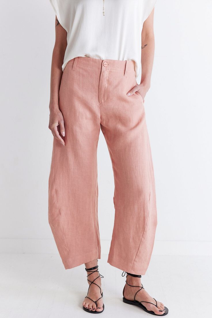 These pants combine the airy comfort of linen with a modern silhouette, offering a stylish option for warmer weather. With their tailored fit and breathable fabric, these pants effortlessly blend sophistication with laid-back charm, making them the perfect wardrobe staple. Tailored fit and tapered leg Elasticized waist with hook-and-bar closure Relaxed leg Breathable fabric Light Wash Loosely Fitted Cotton Pants, Spring Soft-washed Cotton Pants, Linen Wide-leg Pants With Patch Pockets, Full-length Linen Pants With Pockets, Relaxed Fit Full-length Linen Bottoms, Loose Linen Pants, Dusty Coral, Charm Making, Perfect Wardrobe