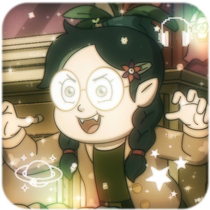 an animated girl with green hair and glasses on her face, standing in front of a fireplace