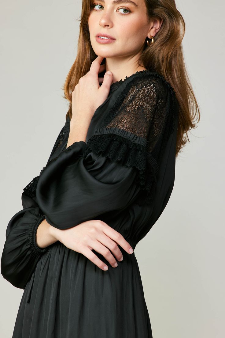 The beauty is in the details of this mini dress. It's got lace-paneled sleeves, ruffle trim, and a sweetly tied neckline. The long-sleeve number has a relaxed fit that cinches in at the waist before falling to a ruffled hem. •Split neckline with self-tie •Lace-paneled long sleeves •Elasticized cuffs •Ruffle trim •Elasticized waist •Ruffled hem item number 2390216 100% Polyester Chic Fall Dress With Lace Collar, Chic Ruffle Sleeve Dress With Lace Trim, Chic Long Sleeve Mini Dress With Lace Trim, Black Long Sleeve Dresses With Elastic Sleeves, Chic Dresses With Lace Trim And Ruffle Sleeves, Fall Mini Dress With Lace Trim, Black Fall Dress With Lace Cuffs, Black Fall Dresses With Lace Cuffs, Fall Long Sleeve Dress With Lace Cuffs