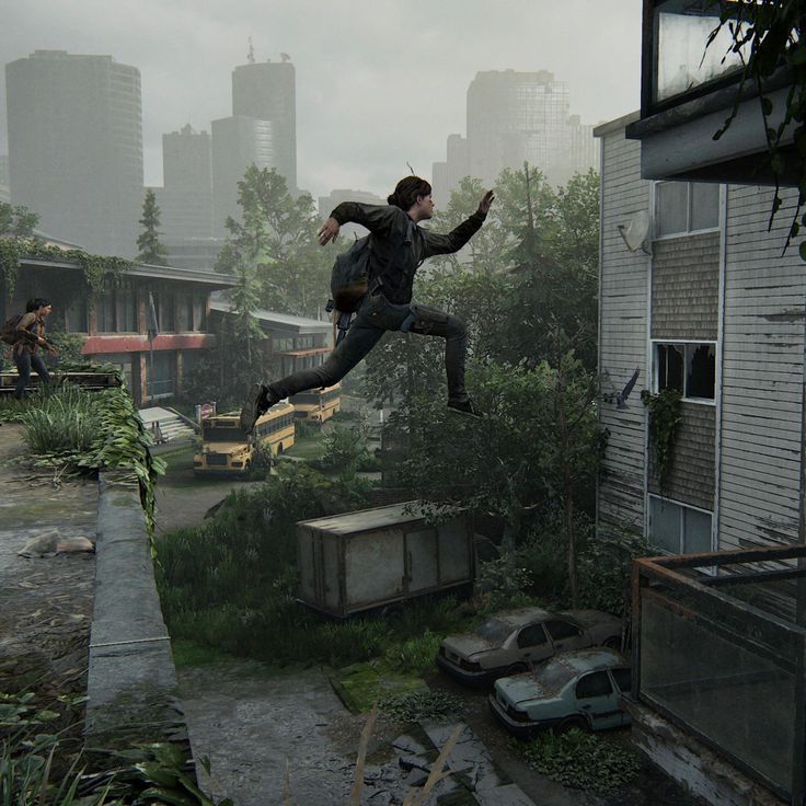 a person jumping in the air with a backpack on their back and buildings in the background