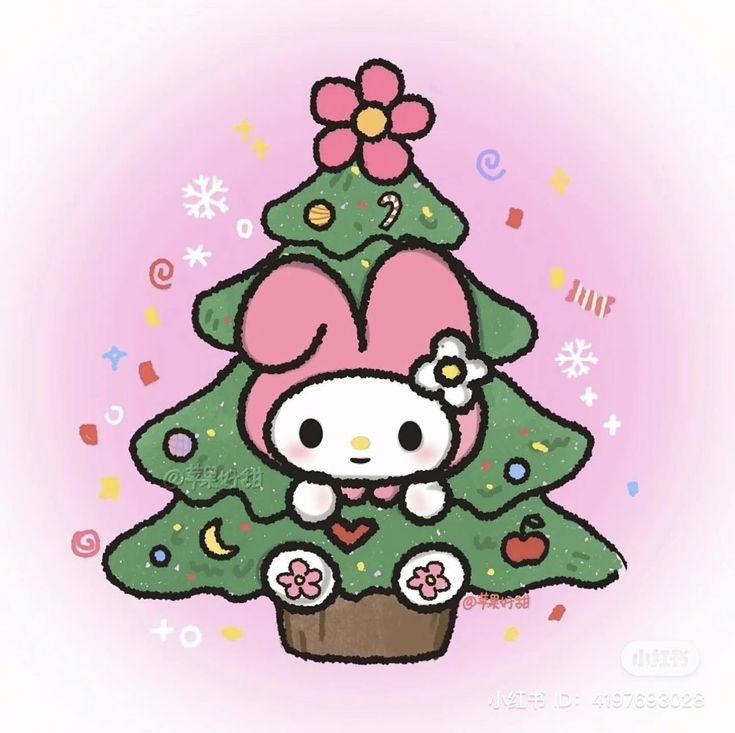 hello kitty sitting on top of a christmas tree