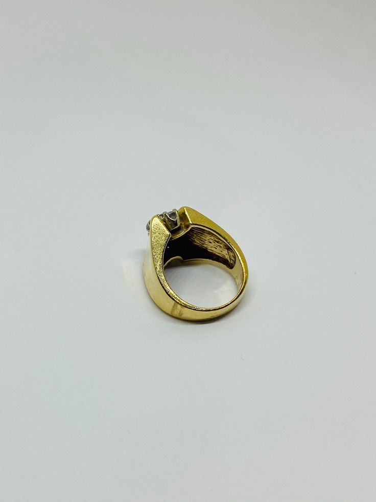 "This is a 14K yellow gold and diamond statement ring. Material(s): 14K yellow gold + (5) diamonds 0.05 of a carat each (This ring is 0.25, or 1/4, of a carat total weight) Total weight: 8.2 grams Flaws (if any): None to mention Marking(s): \"585\" (translating to \"14K\") Size: This ring is a band size 7 U.S. Measurements: The face of this statement ring measures 7.5 millimeters. If you have any questions about this ring, please do not hesitate to contact us! ♥" Vintage Yellow Gold Rings With Diamond Accents, Classic Gold Diamond Signet Ring, Gold Signet Ring With Diamond Accents For Anniversary, Vintage Gold Diamond Ring With Accents, Vintage Gold Diamond Ring With Brilliant Cut, Vintage Gold Diamond Ring With Vvs Clarity, Antique Gold Diamond Ring With Vvs Clarity, Classic Gold Diamond Ring With Accents, Timeless Gold Diamond Cluster Ring