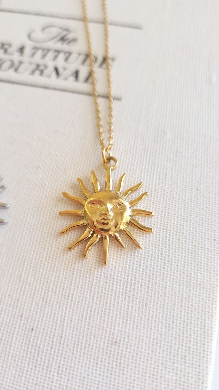 Stainless Steel 18K Gold Plated 17 + 2 1/2 inches (totally adjustable) Charms: Stainless Steel 18k Gold Plated Minimalist Sun Design Necklace As Gift, Symbolic Silver Necklace With Sun Design, Gold Sun Design Necklace In Metal, Silver Sun Design Pendant Necklace, Celestial Sun Design Pendant Necklace, Minimalist Necklace Silver, Luxury Rings, Mens Wedding Rings, Minimalist Necklace