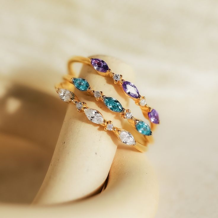 M A R Q U I S E ∙ B I R T H S T O N E ∙ R I N G  Your ultimate stacking ring has arrived! Our Triple Marquise Birthstone Ring allows you to customize to the stone you want. With delicate CZ Diamond gemstones in between each marquise birthstone, this ring shines with even more sparkle. * Material: High Quality Solid 925 Sterling Silver  * Finish: Sterling Silver ∙ 18K Gold ∙ Rose Gold  * Featuring a ~1mm Dainty Ring Band with three ~3.5 x 2mm Marquise Gemstones and ~1mm Round CZ Diamond Stones. ♡ Marquise Jewelry, Custom Gemstone Rings, Initial Tag Necklace, Dainty Initial Necklace, Marquise Ring, Mother Rings, Anniversary Jewelry, Birthday Jewelry Gift, Lovely Jewellery