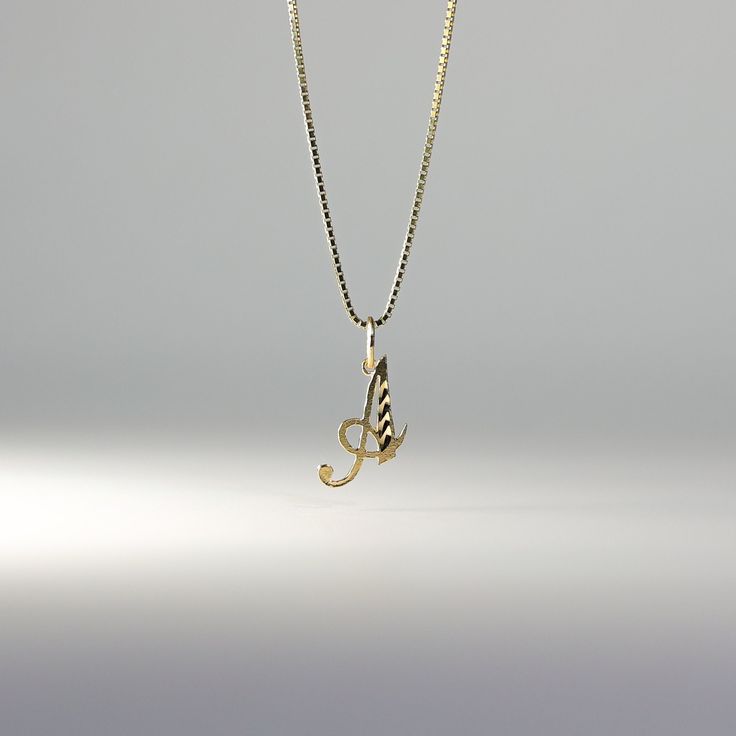 A timeless piece that will never go out of style. This 14K gold calligraphy pendant is the perfect and most stunning way of keeping a name close to your heart. We handmade each piece so you can assure you're getting a one-of-a-kind pendant that is not like any other. This 14K solid gold letter pendant is flawlessly crafted to look super chic and elegant around your neck. Pair it with a nice gold chain and wear it with almost all of your outfits. The piece is such a versatile lettering necklace. Formal Yellow Gold Name Necklace With Initial Pendant, 14k Gold Initial Pendant Name Necklace For Formal Occasions, Formal 14k Gold Name Necklace With Initial Pendant, Formal Yellow Gold Initials Name Necklace, Elegant Yellow Gold Initials Name Necklace, Formal 14k Gold Initial Pendant Necklace, Classic Yellow Gold Pendant Name Necklace, Yellow Gold Box Chain Necklace With Initial Pendant, Yellow Gold Necklace With Box Chain And Initial Pendant