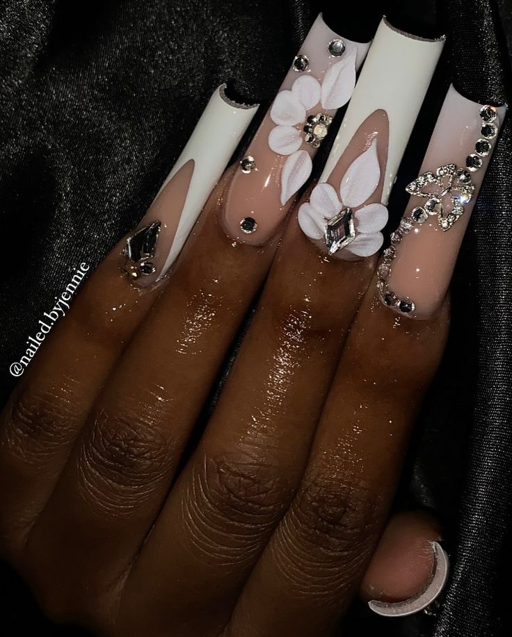 Love doing 3D flowers😩🤍 . . . Dm to book!💖 @nailed.byjennie #longnails #whitenails #ombrenails #blingnails #3dflowernails #frenchnails #nailsnailsnails #nailsofinstagram #nailart #viralnails #viralposts #fresnonails #fresnonailtech #explorepage White Nails W Flower Design, 3d Flower Nails With Diamonds, Nail 3d Flowers, How To Make 3d Flowers On Nails, White Gold Acrylic Nails, 3d Acrylic Flowers Nails, Nail Ideas 3d Flowers, Nails With Flowers 3d, 3d Acrylic Nails Flowers