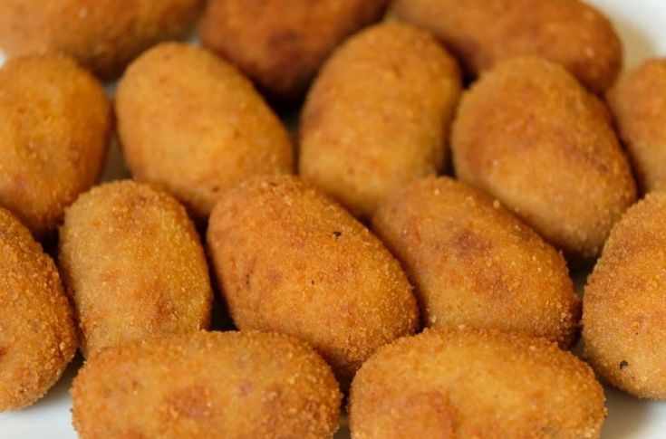 some fried food is sitting on a plate