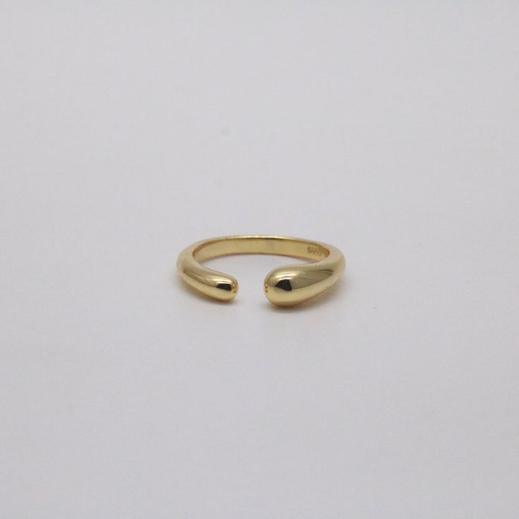 Our Ayn Open ring is 18k gold plated over sterling silver and adjustable to fit different fingers.  18k gold plated Sterling silver base Adjustable from US size 5 to size 8 Ring sizing Middle Finger Ring, Dainty Rings, Rope Rings, Adjustable Jewelry, Butterfly Ring, Snake Ring, Jewelry Lookbook, Brass Ring, Cz Ring