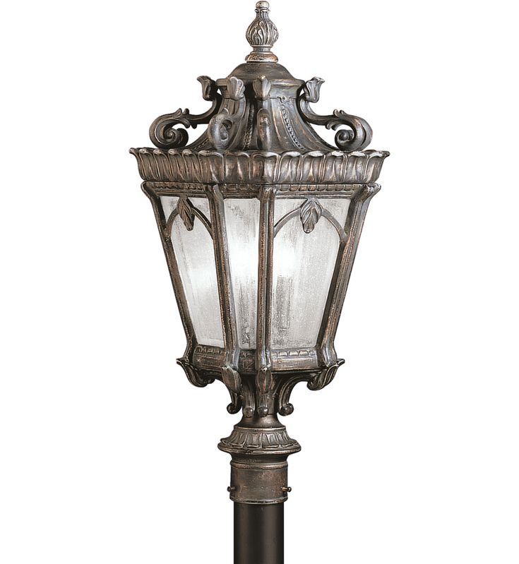 an old fashioned street light on a white background