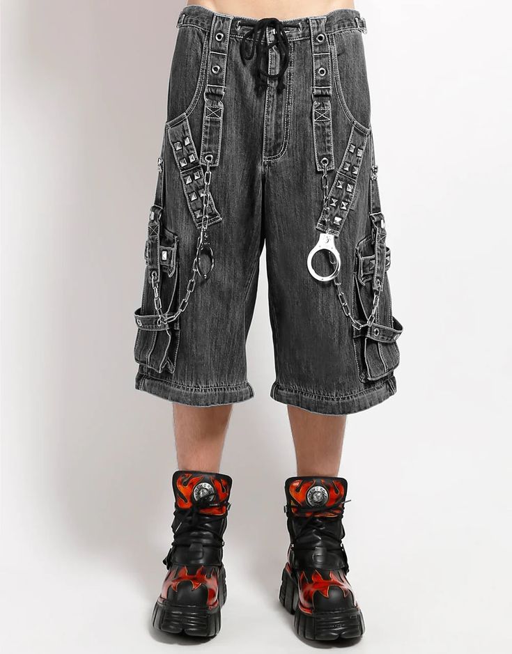 Accept no imitations! From the originator of all things DarkStreet, these black denim pants zip off into shorts and feature removable chains and handcuffs, adjustable ankles, studs, and deep pockets. WOMAN IS WEARING X-SMALLMAN IS WEARING MEDIUMSIZING BASED ON MENS FIT– Refer to Unisex Darkstreet Pant - Size Chart (Based on Men's Sizing)– Drawstring and adjustable waist buckles allow for a tighter fit on the waist– 100% Cotton.– Hand wash cold. Lay flat to dry. Skull Pants, Tripp Pants, Gothic Pants, Black Denim Pants, Strap Pants, Stylish Hoodies, Mens Fashion Jeans, Lock Up, Fashion Jeans