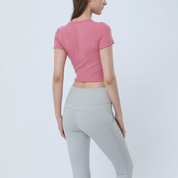 87% Viscose . 13% Spandex Soft. comfortable. skin friendly 4-way stretch. breathable and sweat-wicking Classic V-shape neckline Designed with ruched tailoring for a textured look Cropped designs that allow your skin to breathe all while being cute & trendy. Perfectly pair with your favorite pants. skirts. leggings. joggers. etc. Perfect for both sports activities and daily life Elastane Tops For Pilates With 4-way Stretch, Elastane Tops With 4-way Stretch For Pilates, Athleisure Tops With Light Support And Fitted Style, Breathable 4-way Stretch Tops For Pilates, Seamless Elastane Tops For Light Exercise, Fitted Yoga Top With Light Support, Solid Ruched Activewear For Yoga, Casual Elastane Tops For Pilates, Moisture-wicking Elastane Yoga Tops